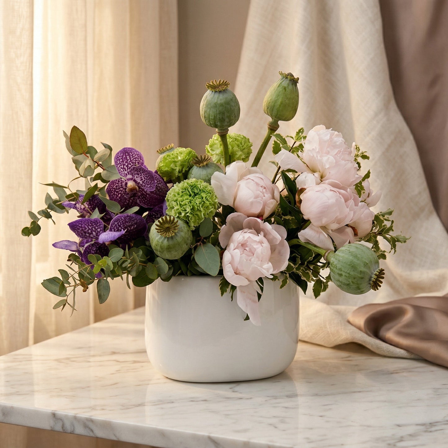 Pastel pink peonies, purple vanda orchids, and green poppy pods in a white ceramic vase. - TJ Flowers NYC
