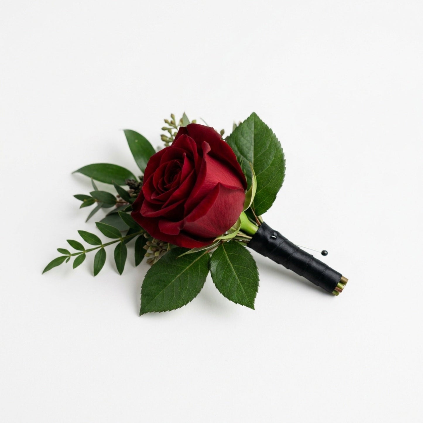 Red rose boutonniere by TJ Flowers NYC