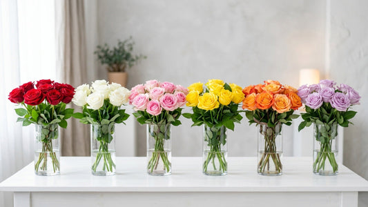 Roses in different colors in individual glass vases