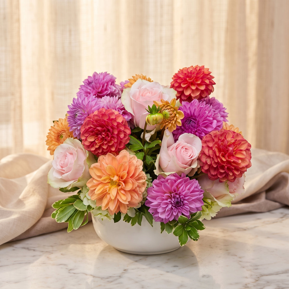 Dahlias in magenta, coral, peach and lavender with blush roses - TJ Flowers NYC