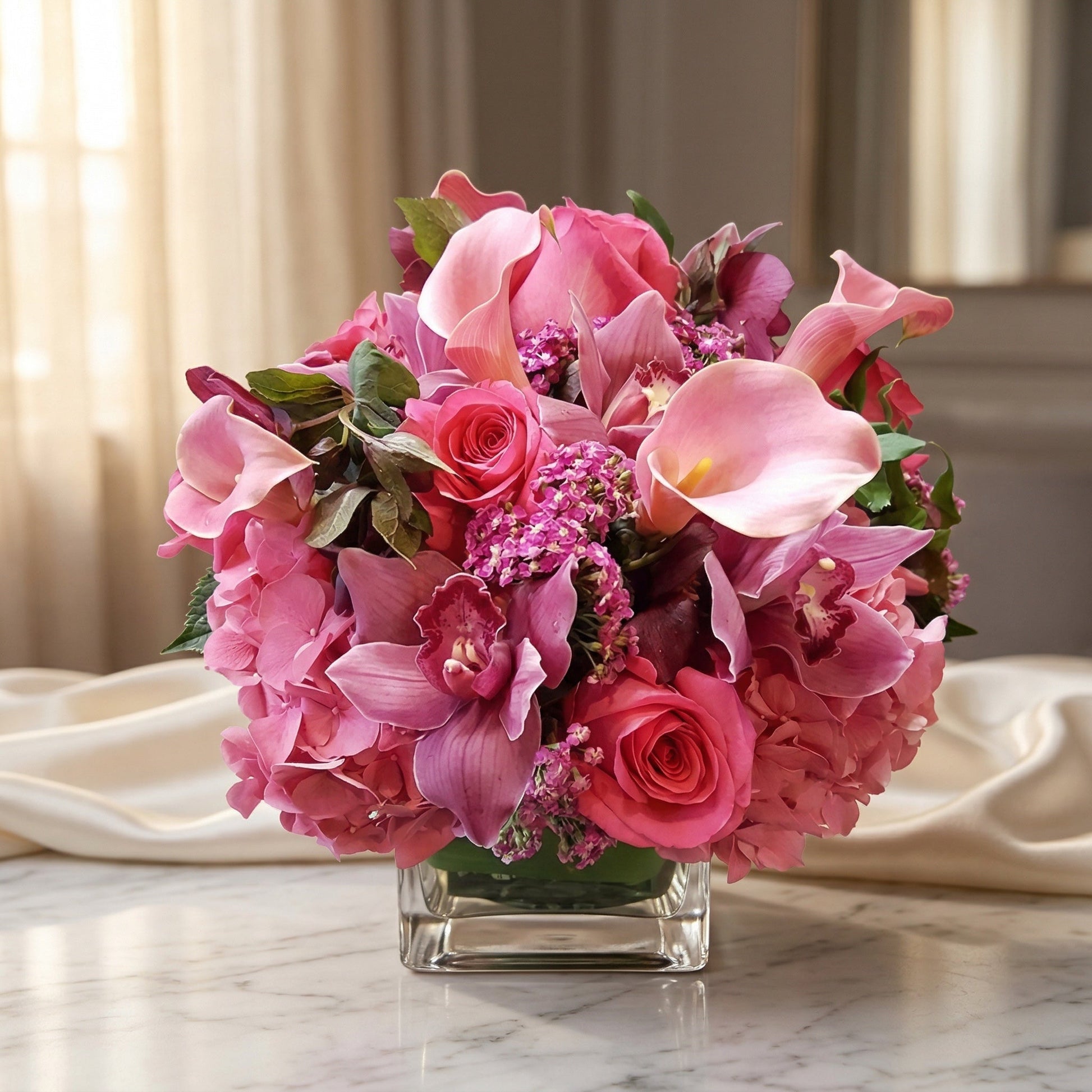 Pink roses, orchids, calla lilies, and hydrangeas in a square glass vase - TJ Flowers NYC