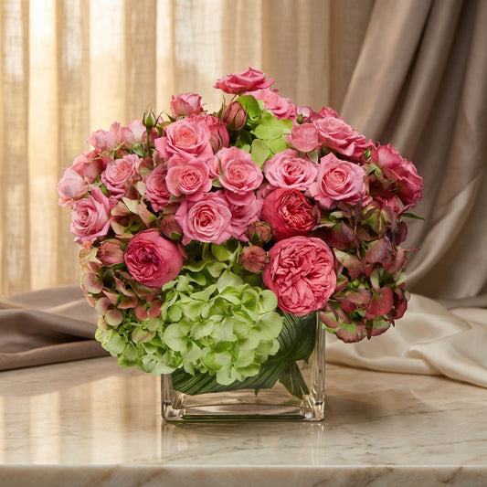 Pink roses and green hydrangeas in a square glass vase - TJ Flowers NYC