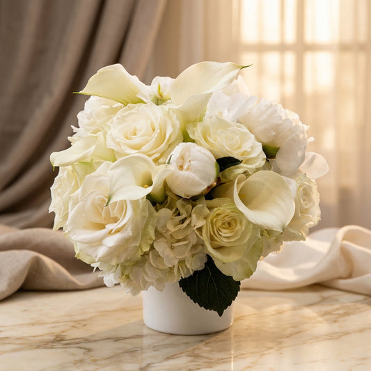 Elegant white bouquet with roses, peonies, and calla lilies in a white vase - TJ Flowers NYC