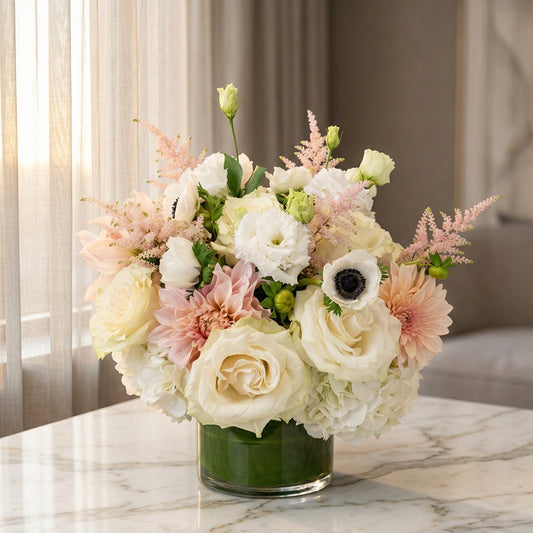 Pastel bouquet with white roses, pink dahlias, and hydrangeas in a glass vase - TJ Flowers NYC