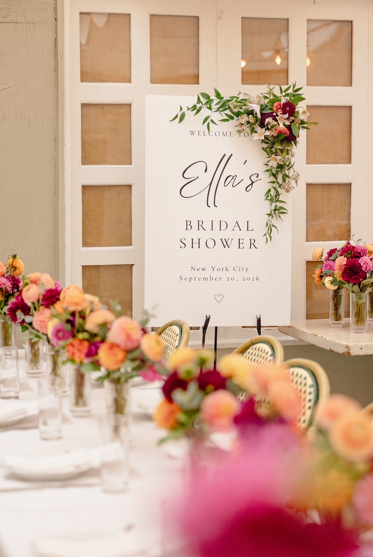 Bridal shower welcome sign with a cascading spray of dahlias, wax flower and greenery, NYC - TJ Flowers & Events